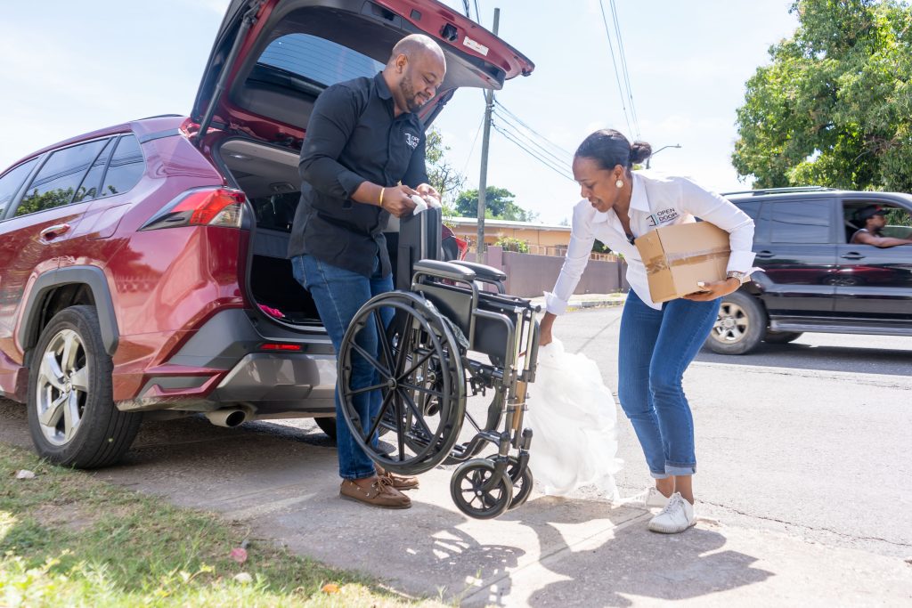 Open Door Jamaica Foundation directors Terri-Karelle and Alex V. Sterling, deliver wheelchairs that were donated in partnership with Toyota Jamaica 